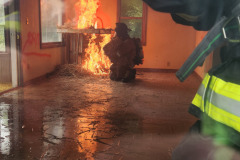 Firefighter in gear at training burn
